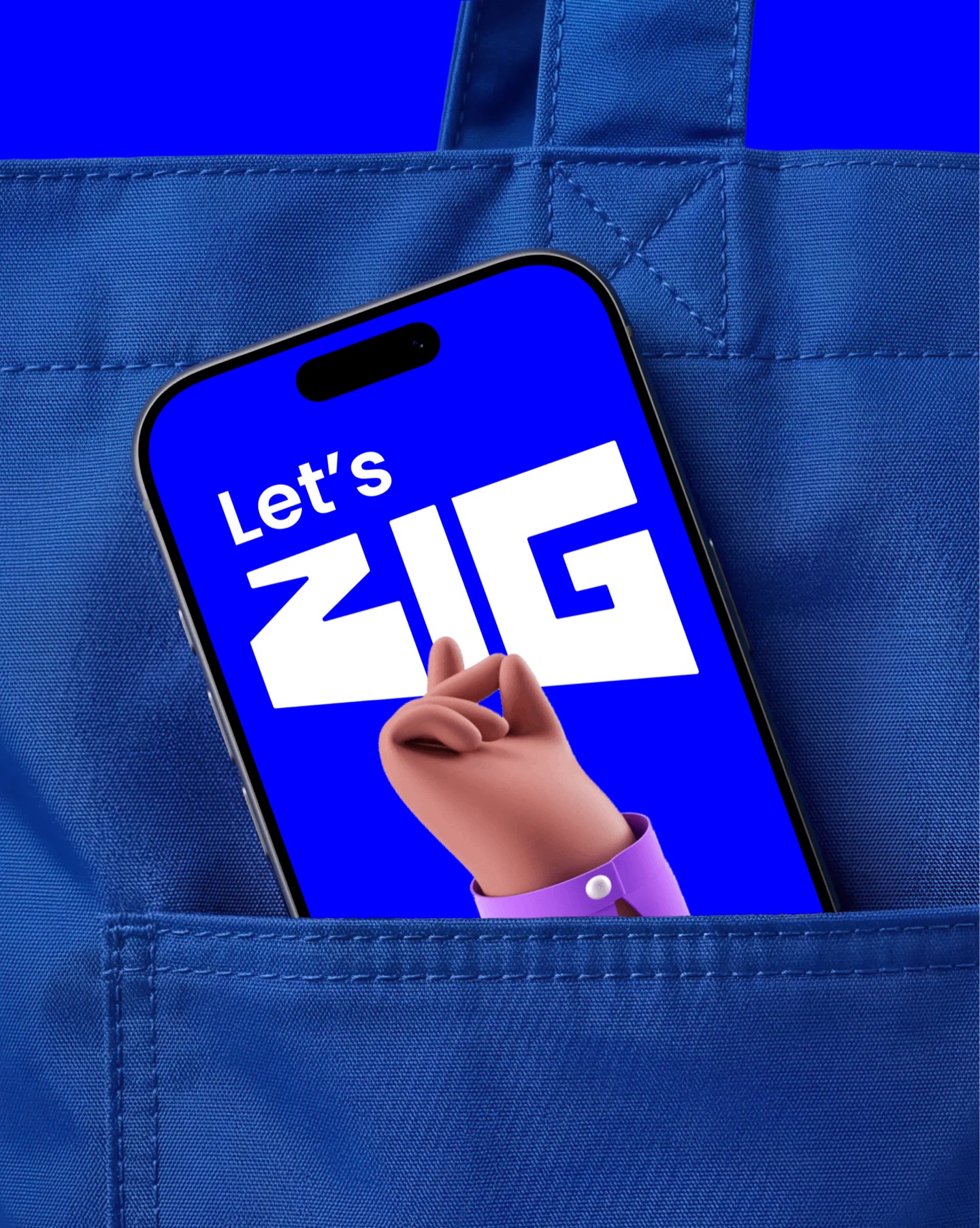Zig: phone in the pocket of a blue tote bag showing the launch screen, Let's Zig