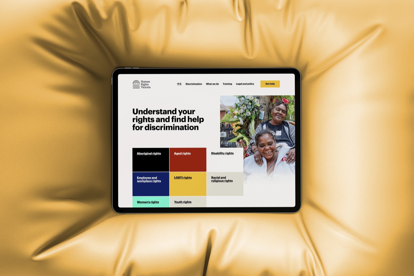 Tablet showing the Human Rights Victoria website: Understand your rights and find help for discrimination