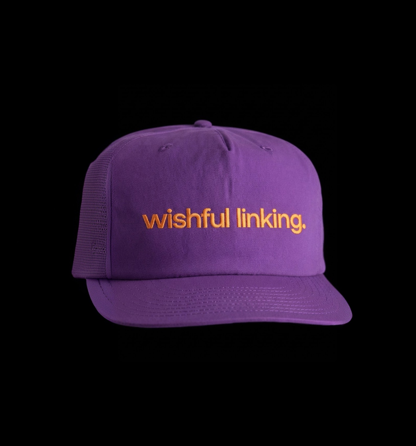 Purple Linktree cap embroidered in orange with the words wishful linking.