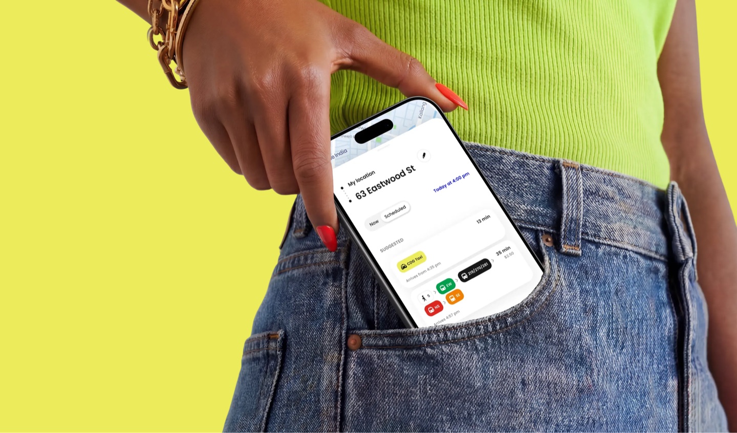 Phone slipping into a jeans pocket, showing Zig ride options from 63 Eastwood St
